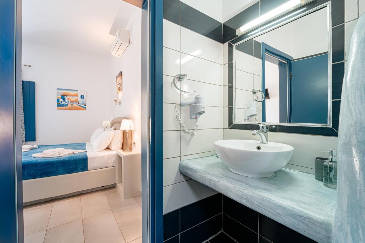 Marousi Suites Перисса Экстерьер фото
