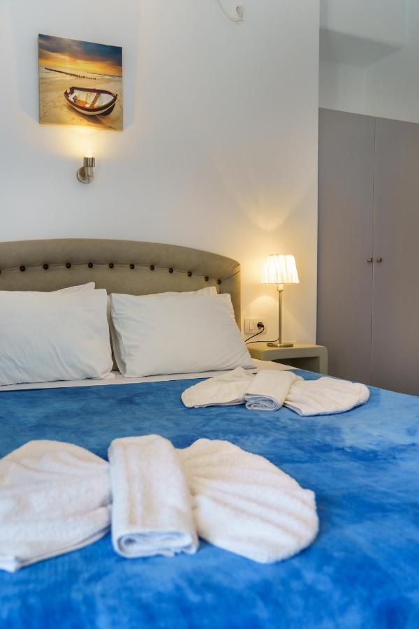 Marousi Suites Перисса Экстерьер фото