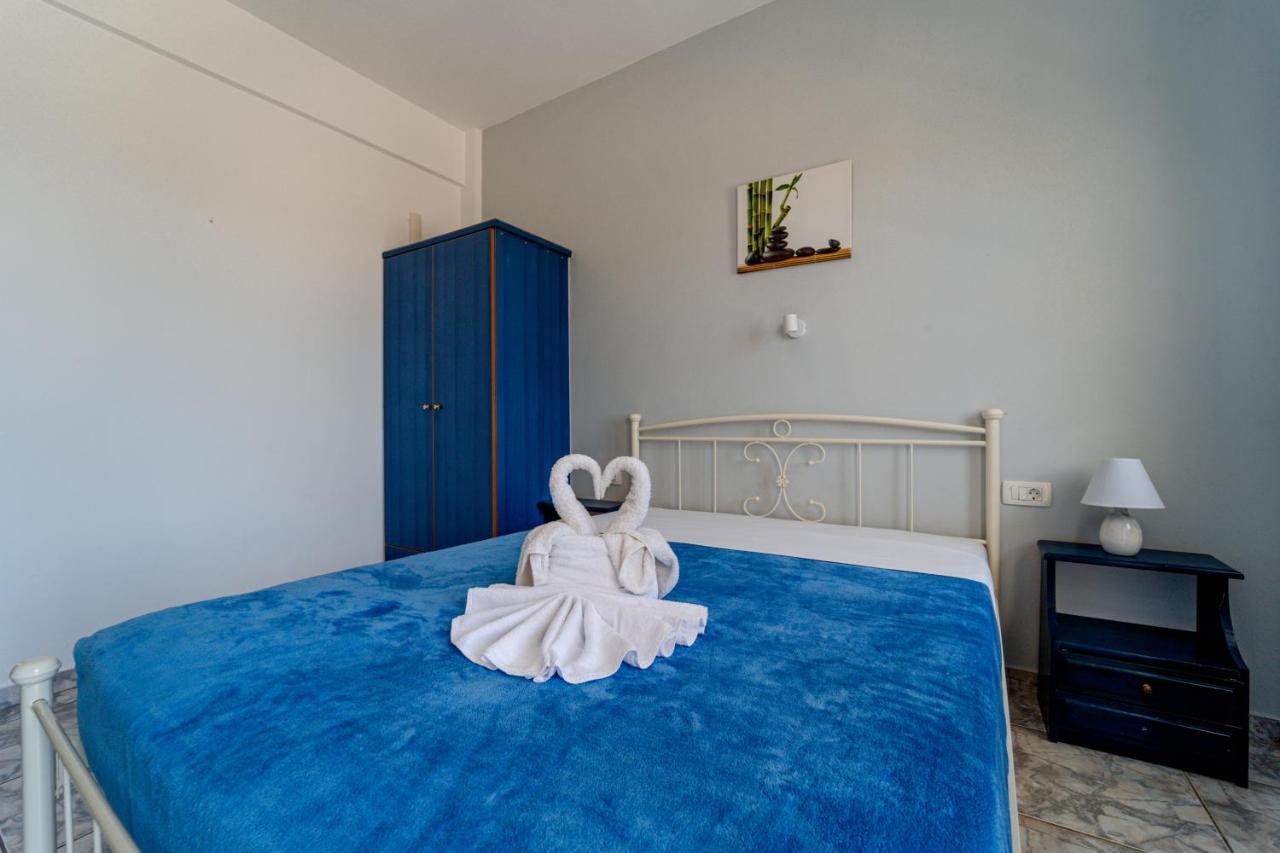 Marousi Suites Перисса Экстерьер фото