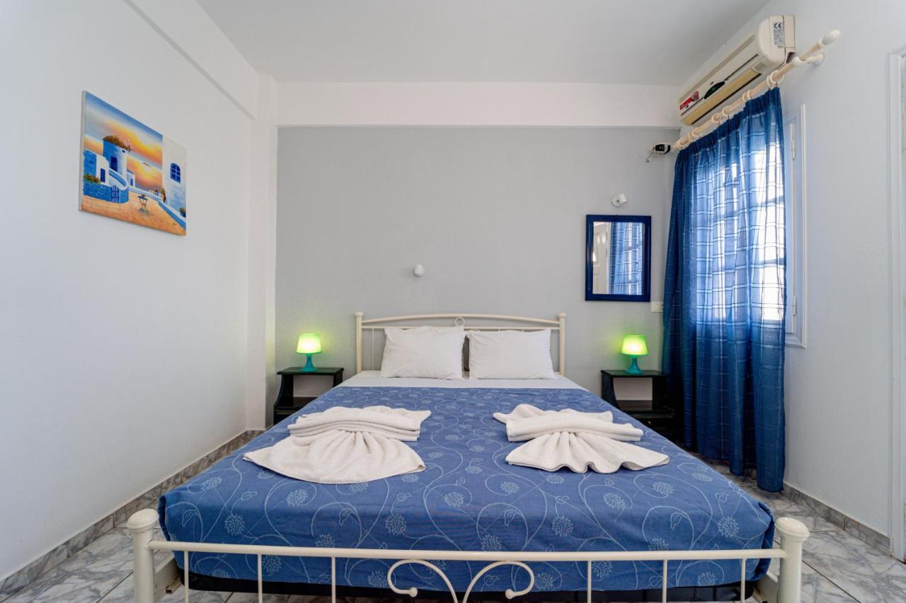 Marousi Suites Перисса Экстерьер фото