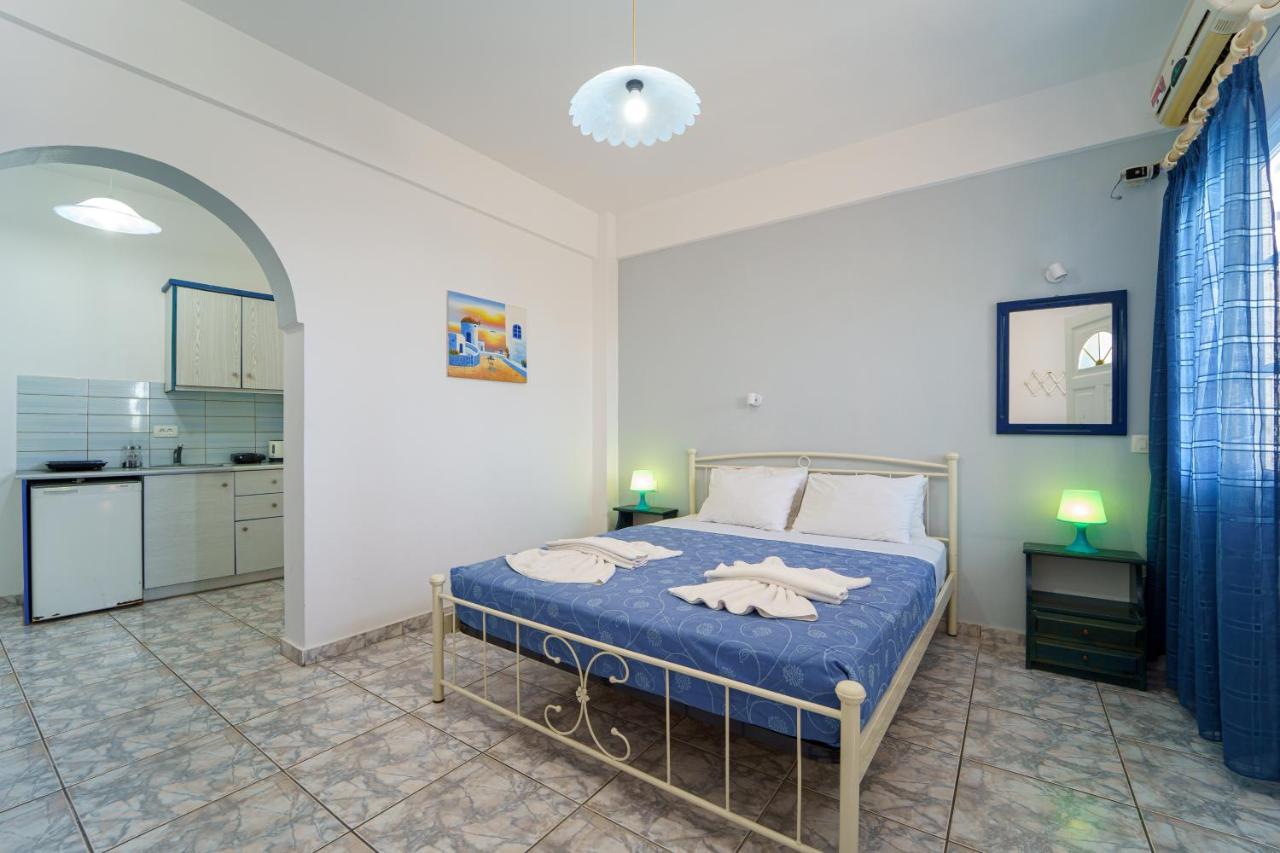 Marousi Suites Перисса Экстерьер фото